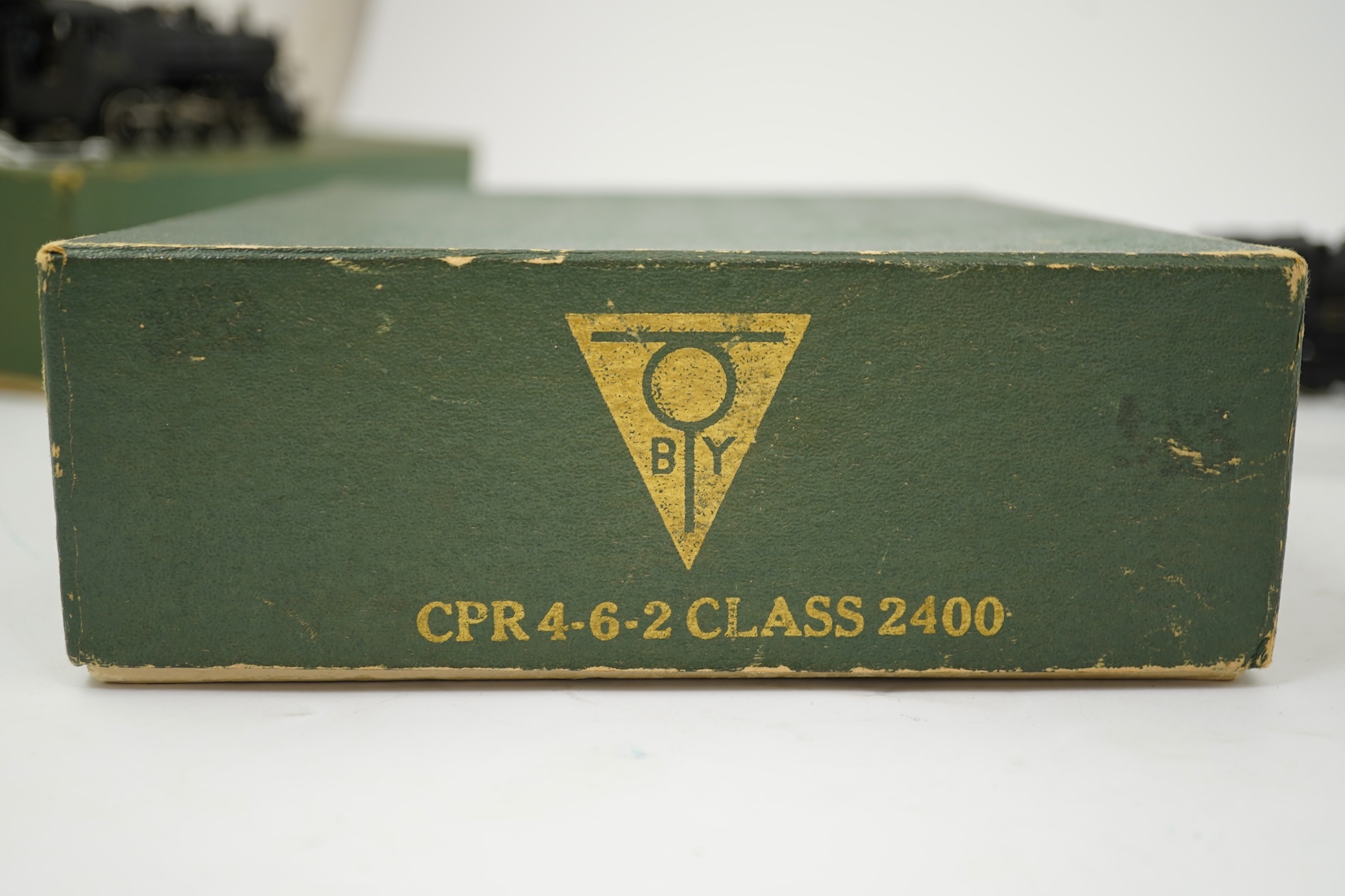 Two boxed HO gauge Canadian Pacific locomotives; a Toby of Japan model of 2412, 4-6-2 locomotive with bogie tender, together with a United Scale Models 3710, 2-8-0 locomotive with bogie tender, both powered for two rail